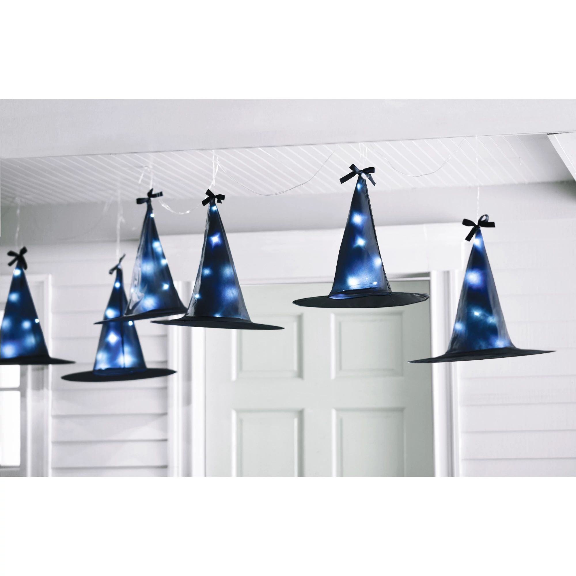 Fairy lights with oversized witch hats