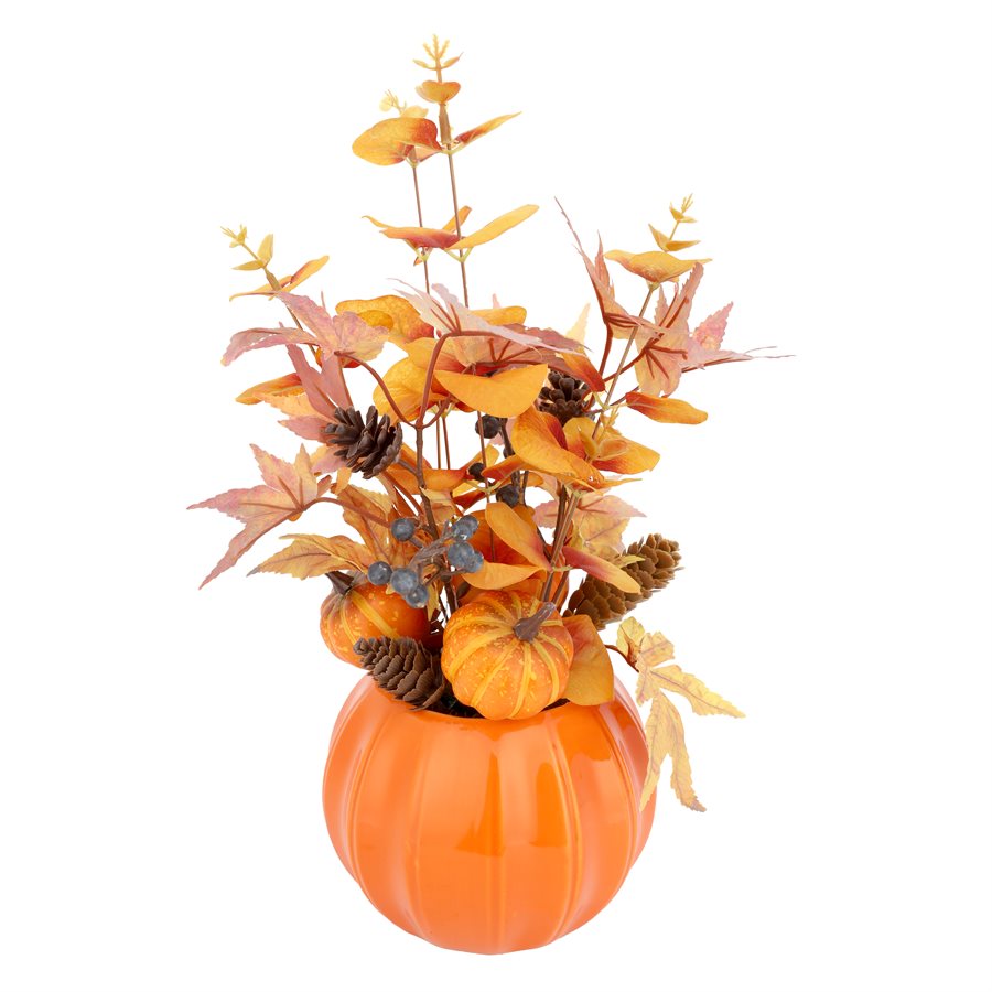 Autumn arrangement in a ceramic pumpkin