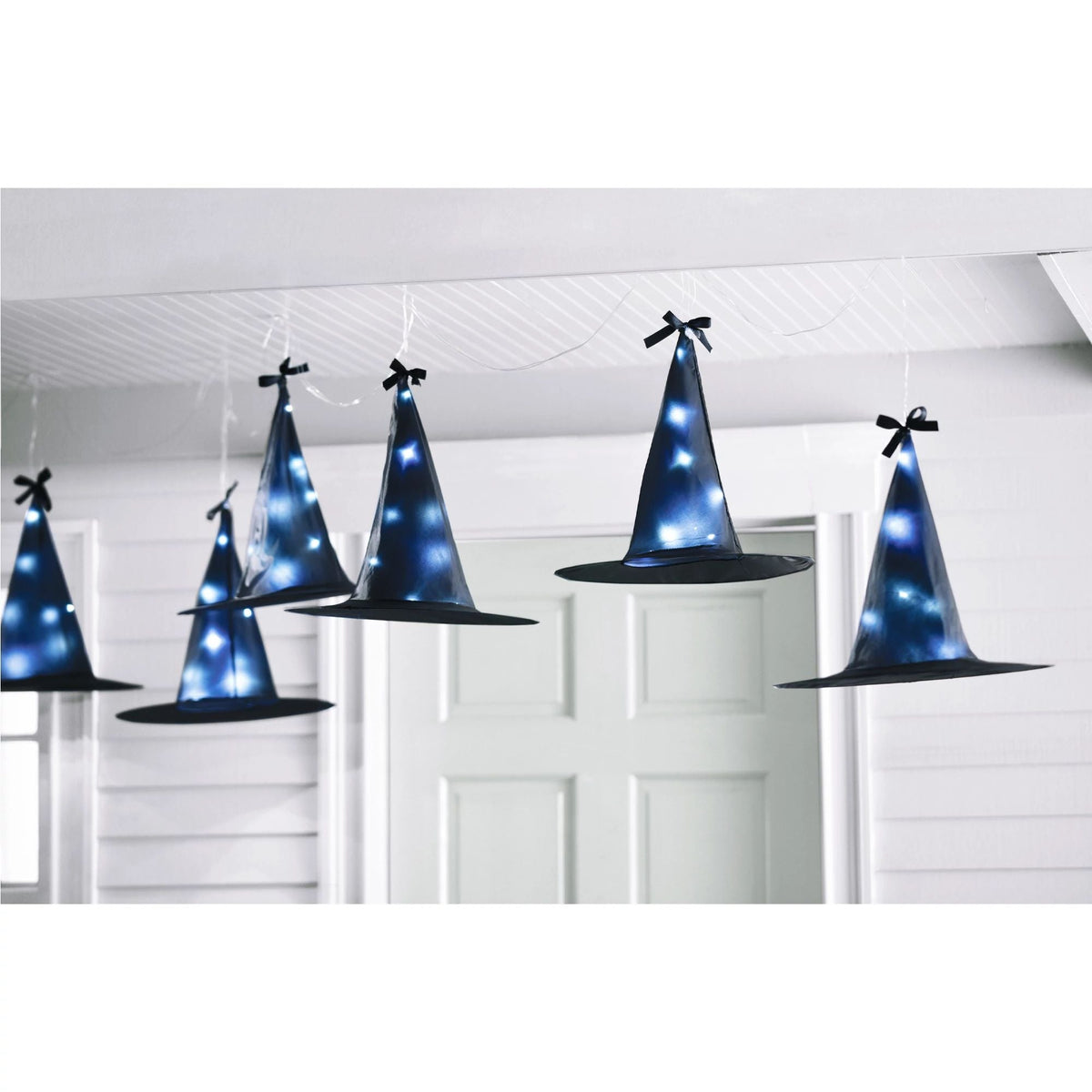 Fairy lights with oversized witch hats