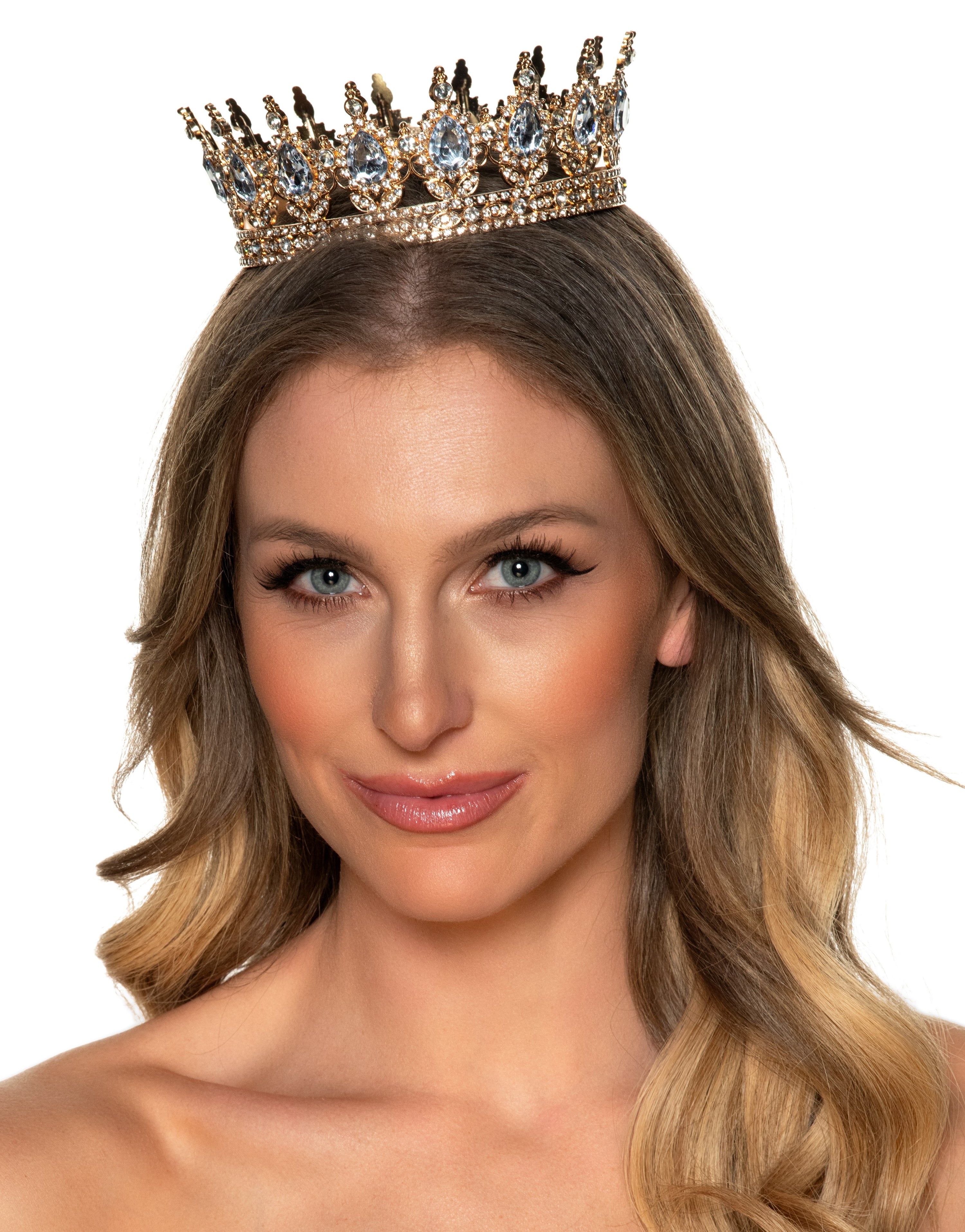 Couronne de reine dorée avec pierres argentées