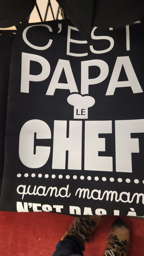 Tablier noir "C'est papa le chef, quand maman n'est pas là"