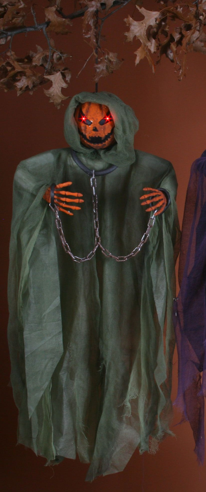 Personnage citrouille à suspendre avec yeux lumineux (36")