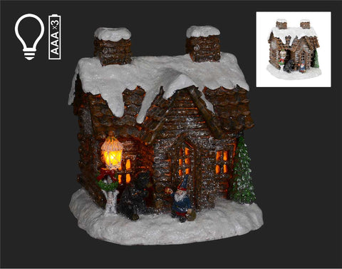 Illuminated wooden cabin with gnome (9")