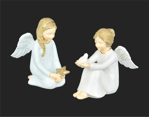 Figurine: Seated angels holding a star or bird in their hands