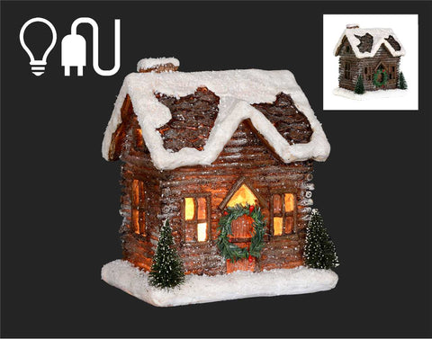 Illuminated wooden house with snow (8")